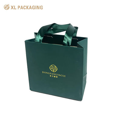 acquistare Borsa regalo per gioielli personalizzata. Borsa di carta di lusso con maniglia a nastro. fabbricazione online