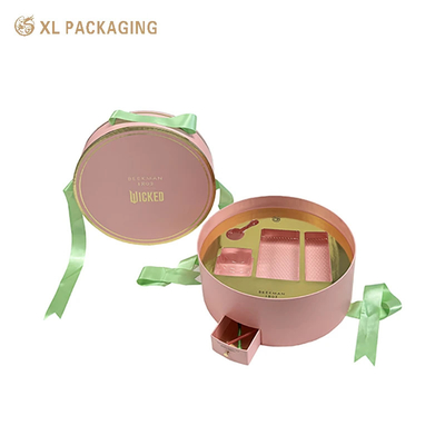 comprare Scatole di lusso personalizzate all'ingrosso Scatole di carta cosmetica rotonda con design unico Mini cassetto con nastro verde Maniglia e vassoio d'oro Per prodotti di bellezza essenziali online manufacture