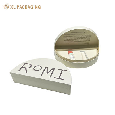 Scatola cosmetica di lusso stampata su misura con logo in rilievo e inserto EVA a forma semicircolare per profumi e cura della pelle