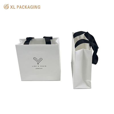 Borsa di carta di stampa di lusso personalizzata Borsa regalo di carta di imballaggio Borsa di carta con il logo personalizzato Borsa di spedizione