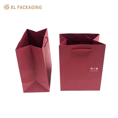 Borsa di carta con cartellone Borsa di carta rivestita di vino colore rosso Borsa da mano di carta per scatole regalo Imballaggio Borsa da spedizione regalo con il tuo logo