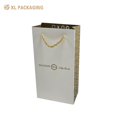 Imballaggio eco-compatibile per boutique Regali Rivendita di alta qualità Colore oro Borse da shopping riciclabili Borse da shopping di lusso OPP String Handle Borse di carta con foglio d'oro