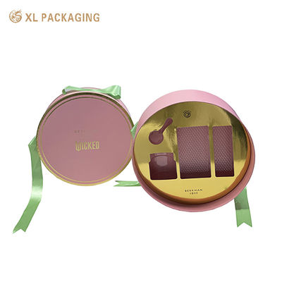 Scatola regalo cosmetica a due pezzi, rigida rosa nuda con stampo a caldo in oro con nastro di raso verde e inserto PET