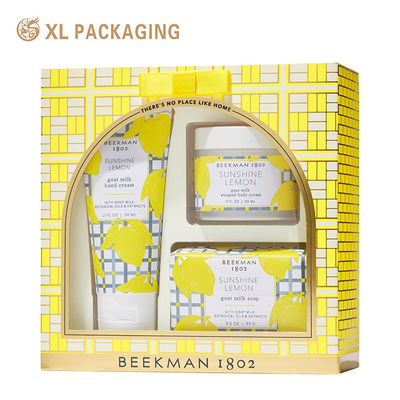 Scatola regalo di lusso stampata su misura con grande finestra trasparente ad arco e arco satinato decorativo per imballaggi cosmetici